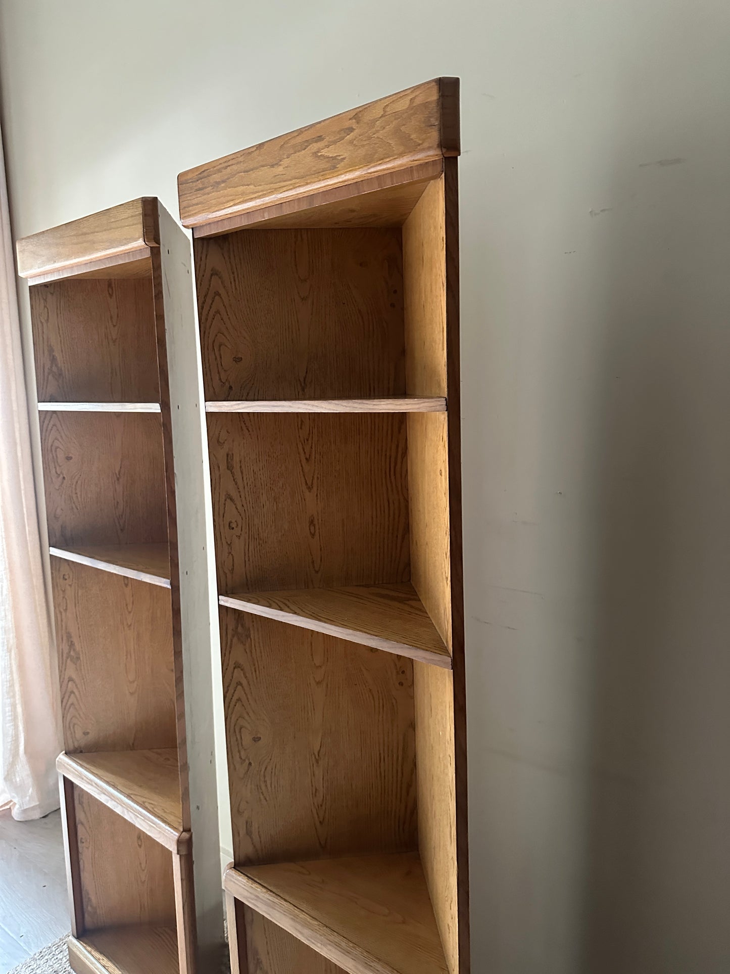 Laminate oak corner shelves. Sold individually.