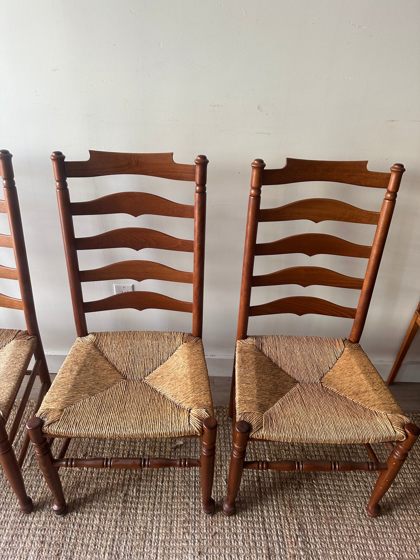 Set of 4 ladder back chairs. Sold as a set.
