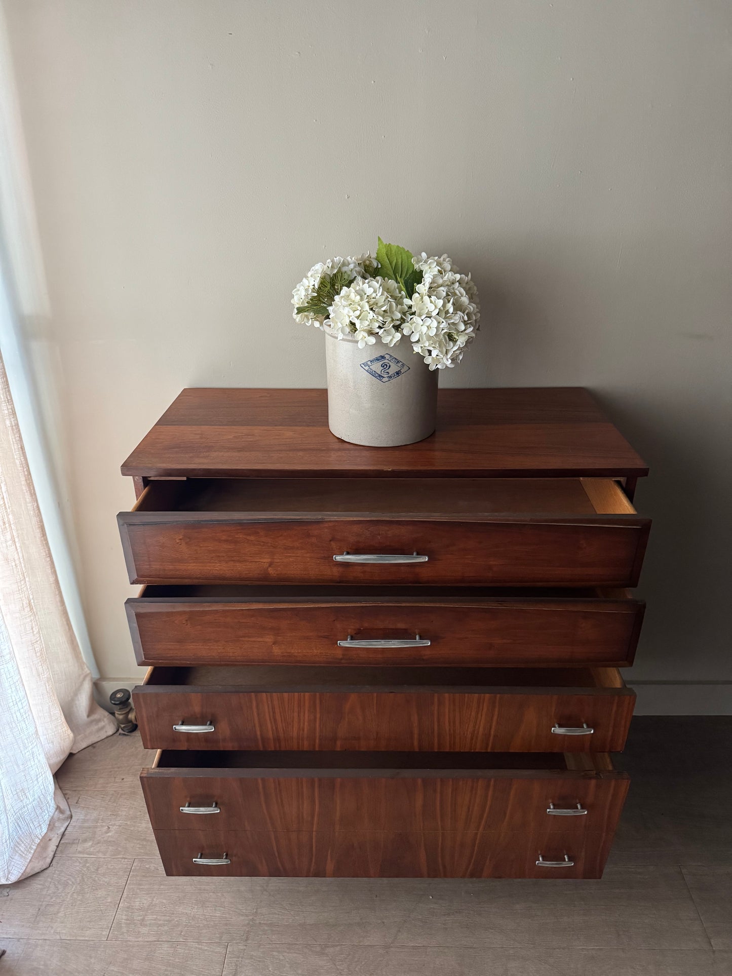Walnut tallboy with chrome handles