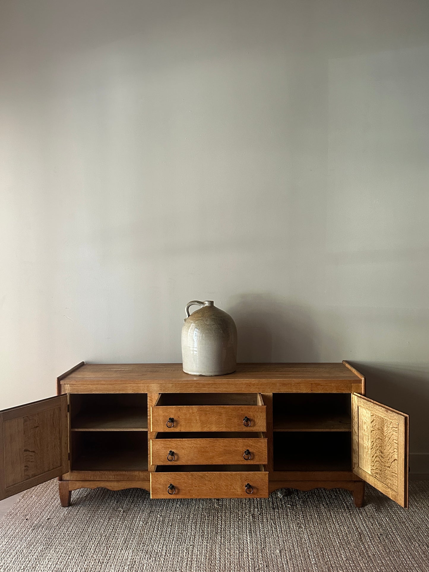 Danish oak sideboard with iron handles by Henning Kjaernulf