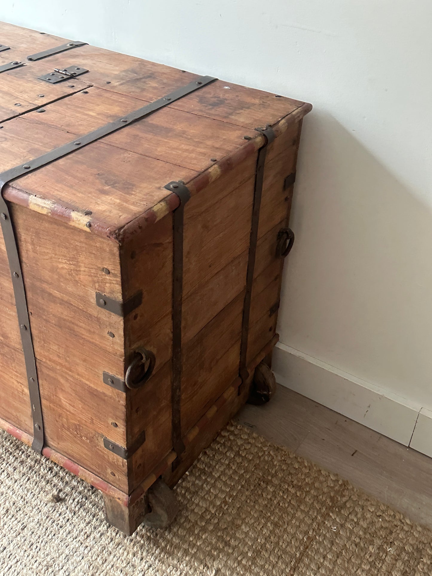 Large wooden chest on castors