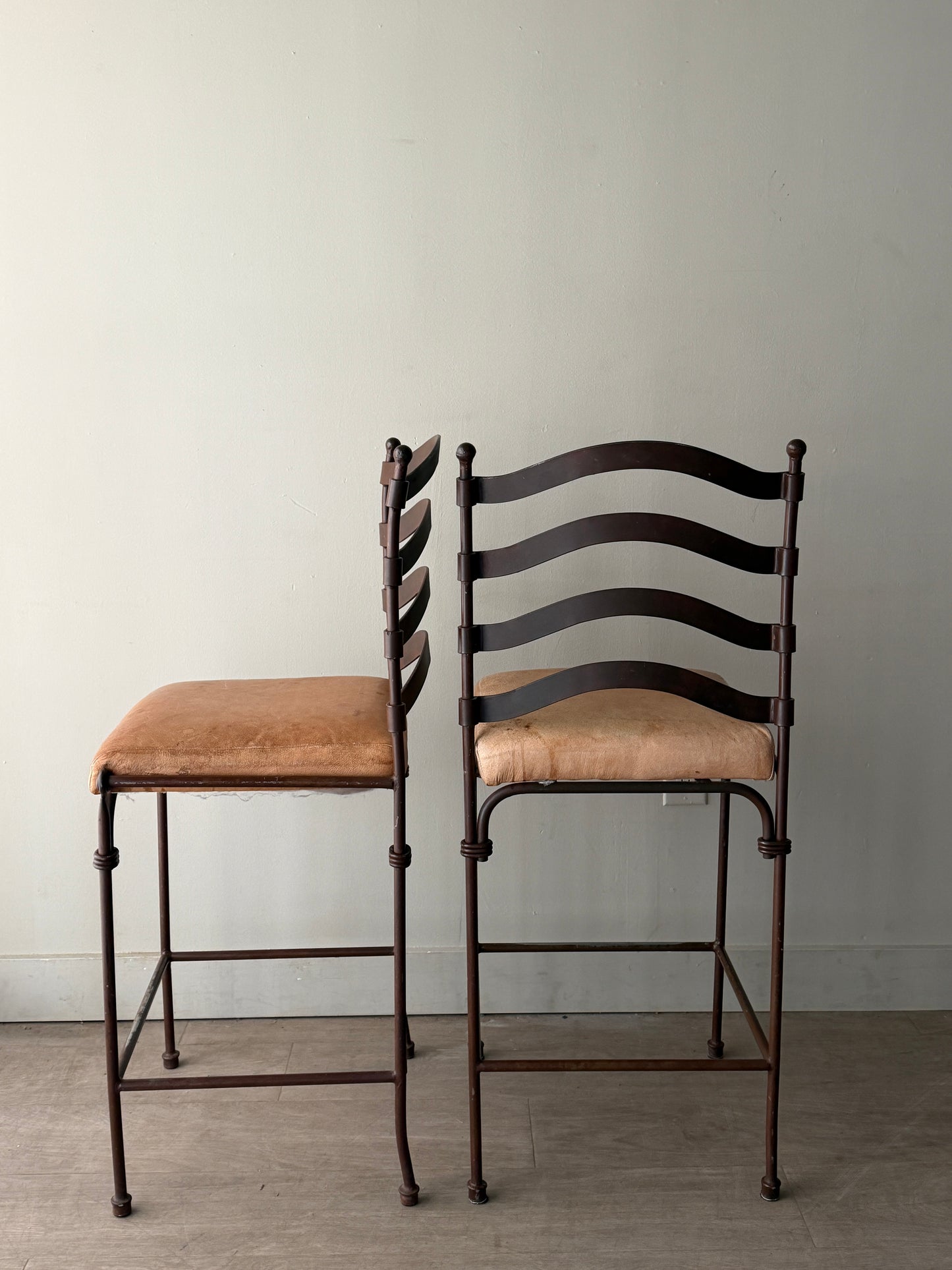 Wrought iron bar stools. Sold as pair.