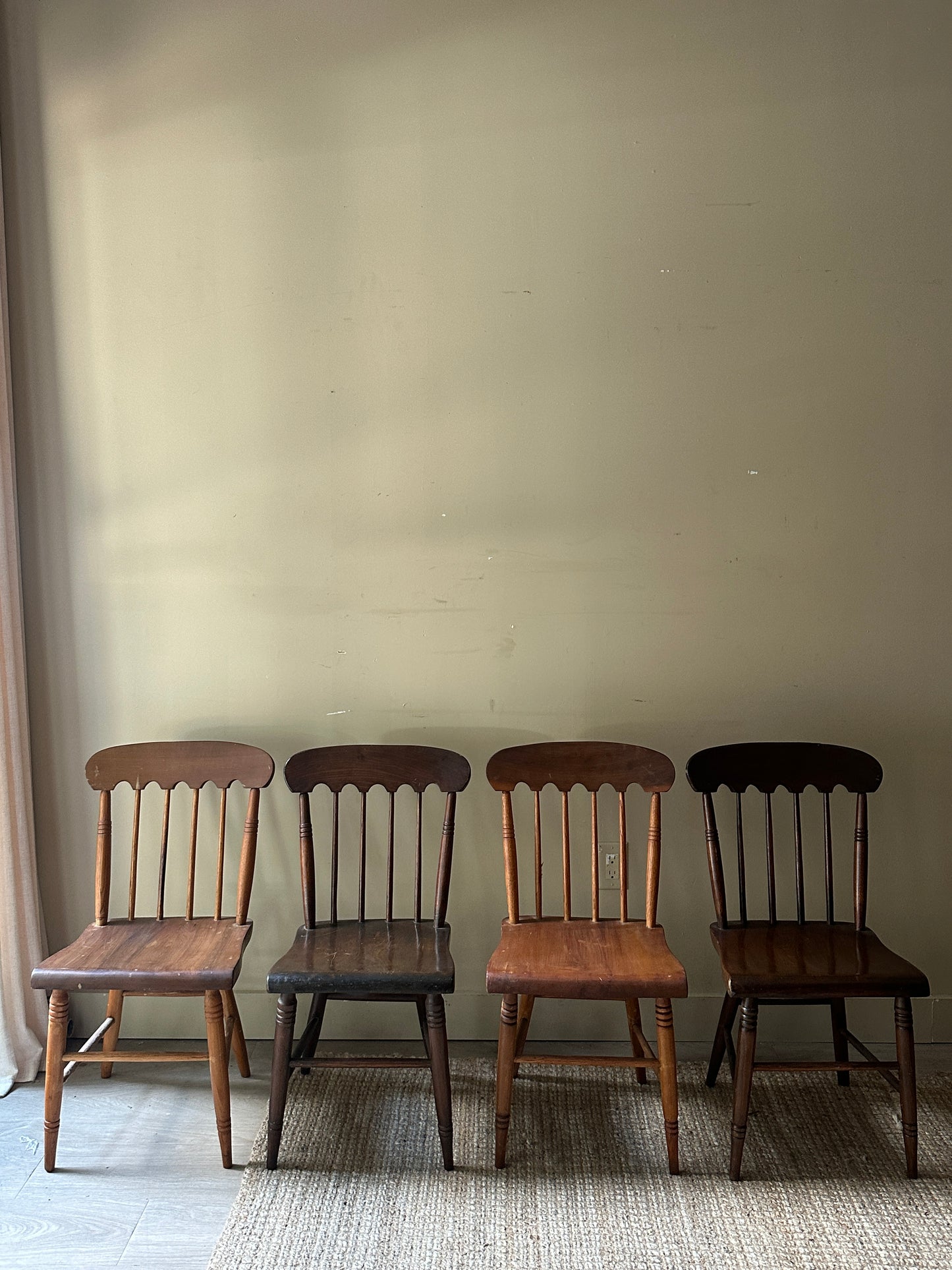 Scalloped mixed wood dining chairs. Sold in pairs.