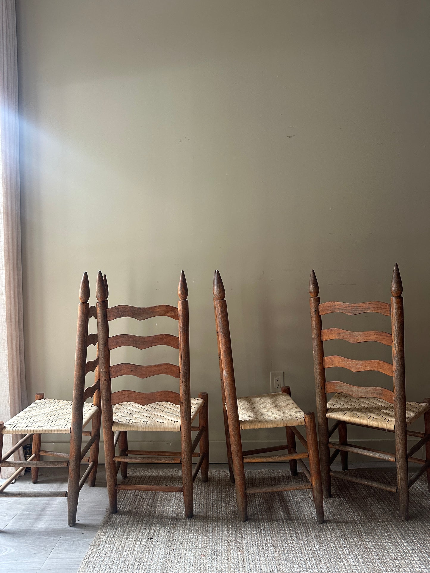 Woven ladder back chairs. Sold as set of 4.