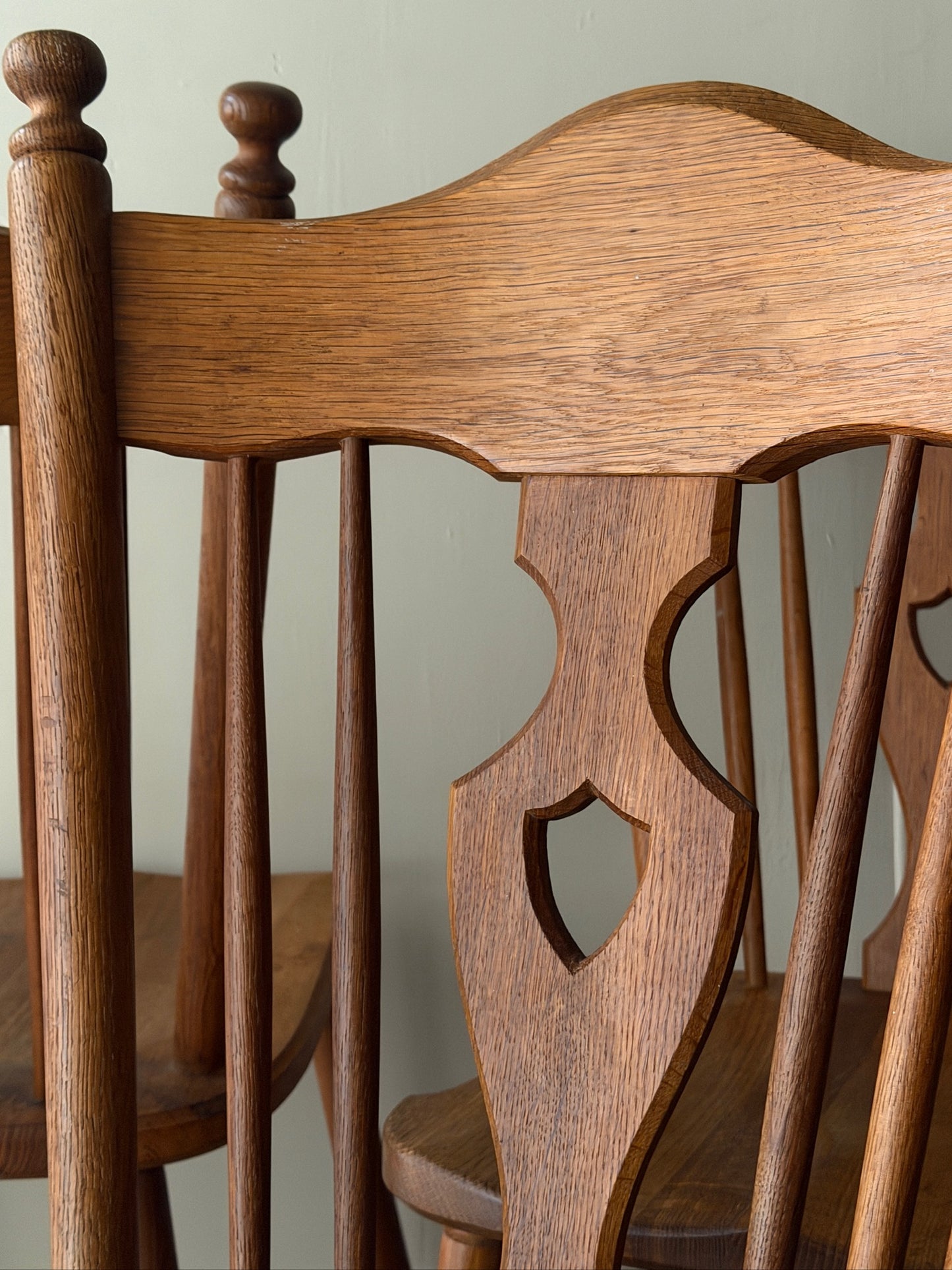 Scandinavian oak dining chairs. Sold as a set of 4.