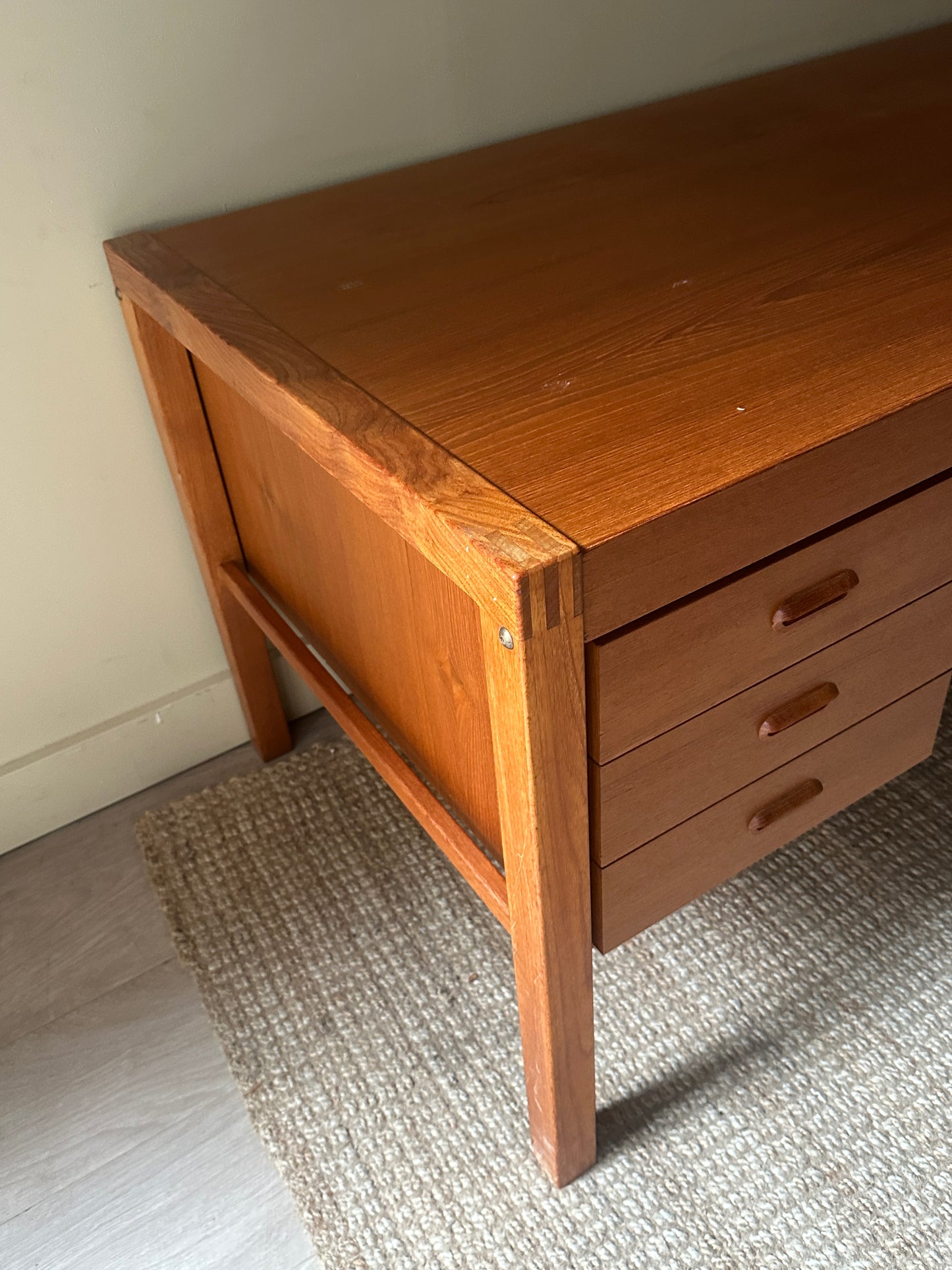 Teak desk. Right drawer locked.