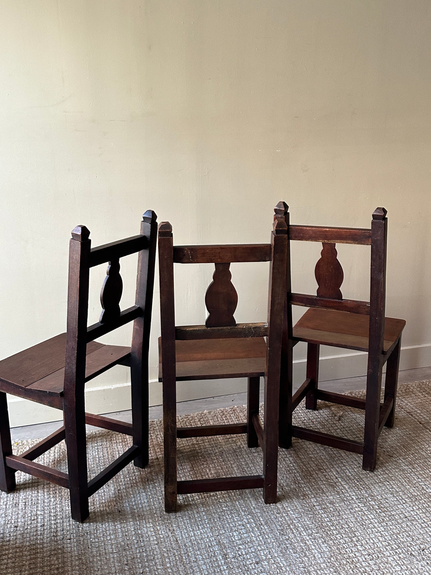 Pair of Mission walnut dining chairs.