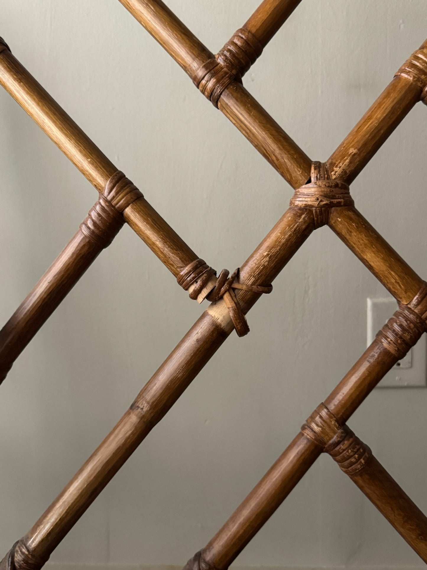 Bamboo arm chairs. Sold individually.