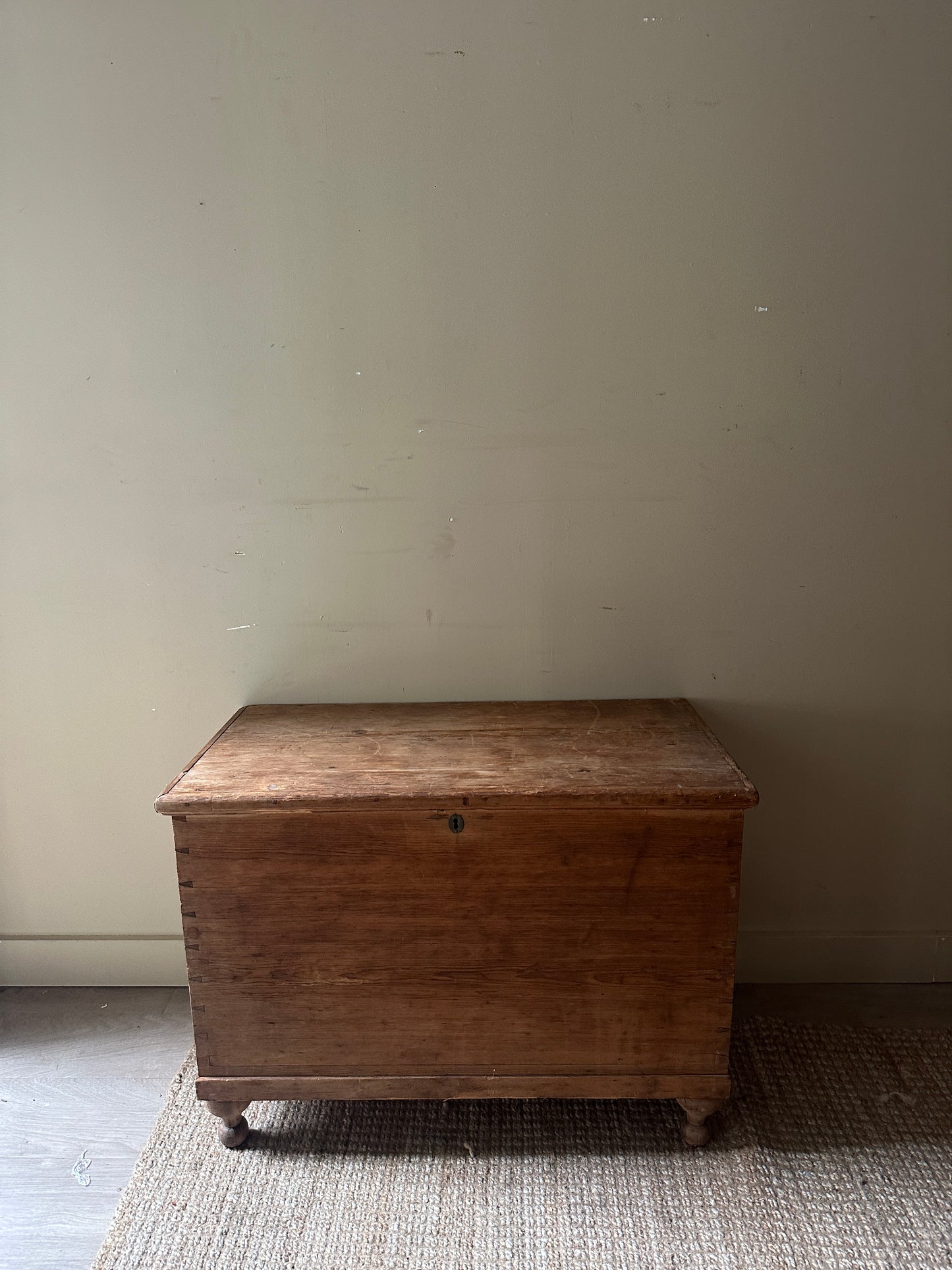 Light pine ball foot chest