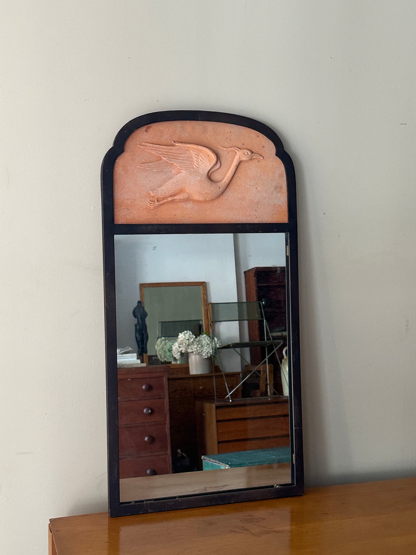 Metal and terracotta heron mirror