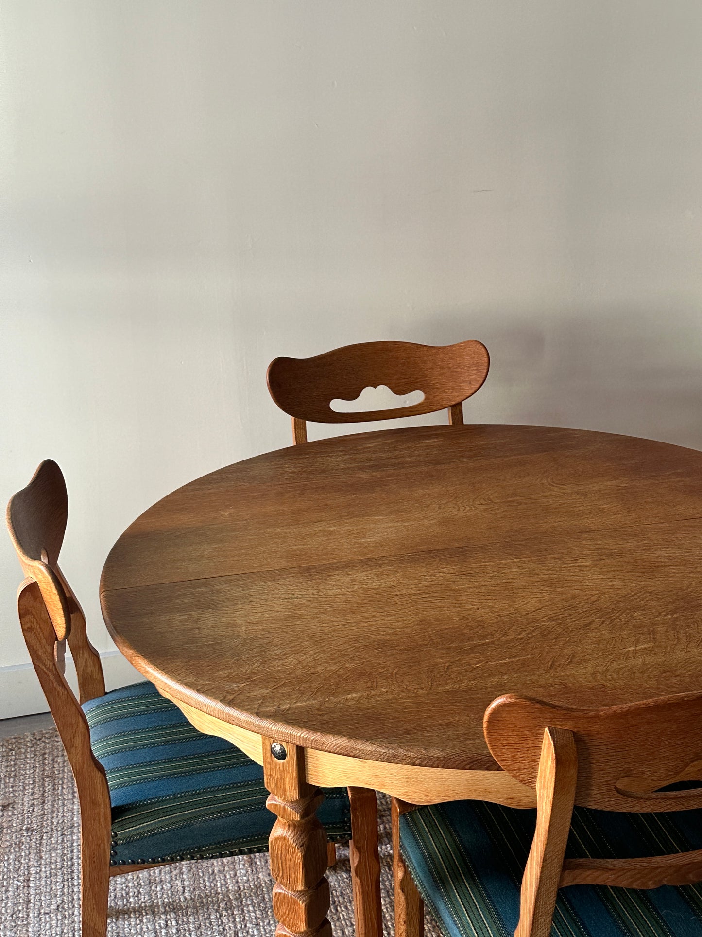 Carved block leg dining table with leaf