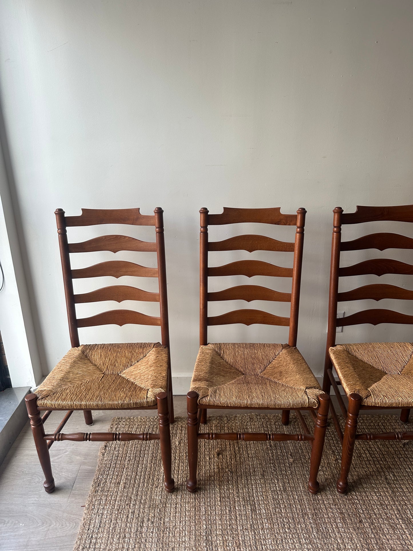 Set of 4 ladder back chairs. Sold as a set.