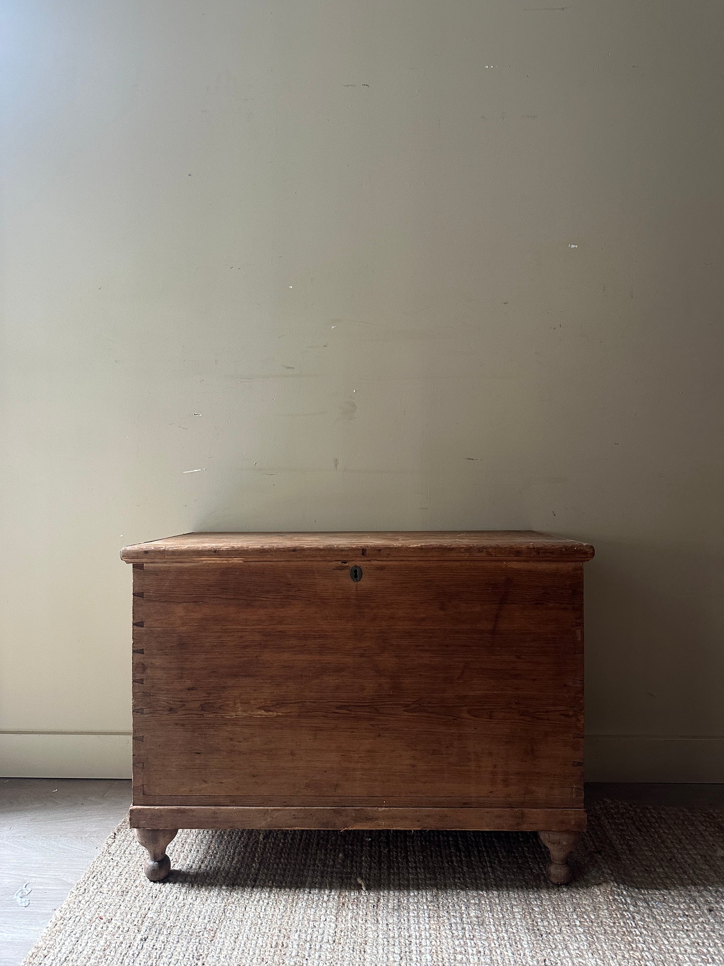 Light pine ball foot chest