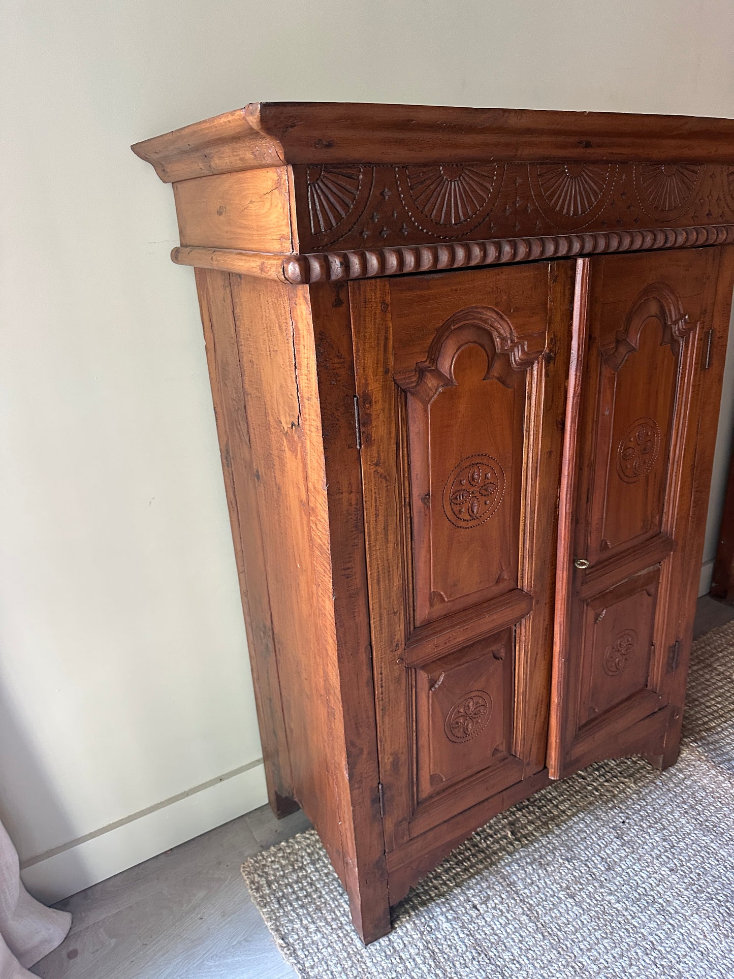 Carved pine cabinet