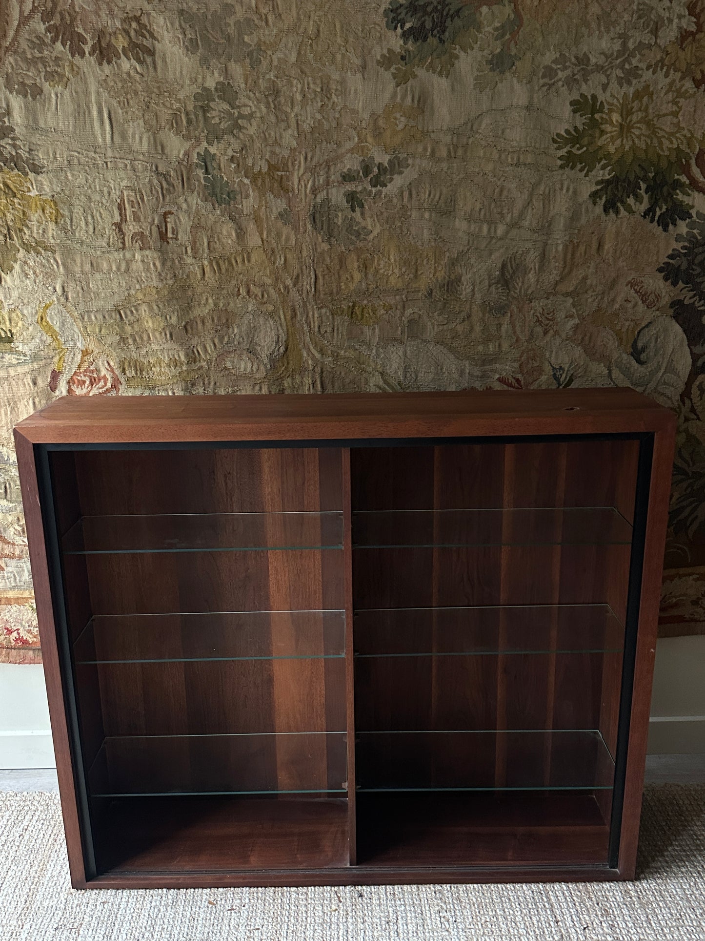 Walnut and glass bookshelf