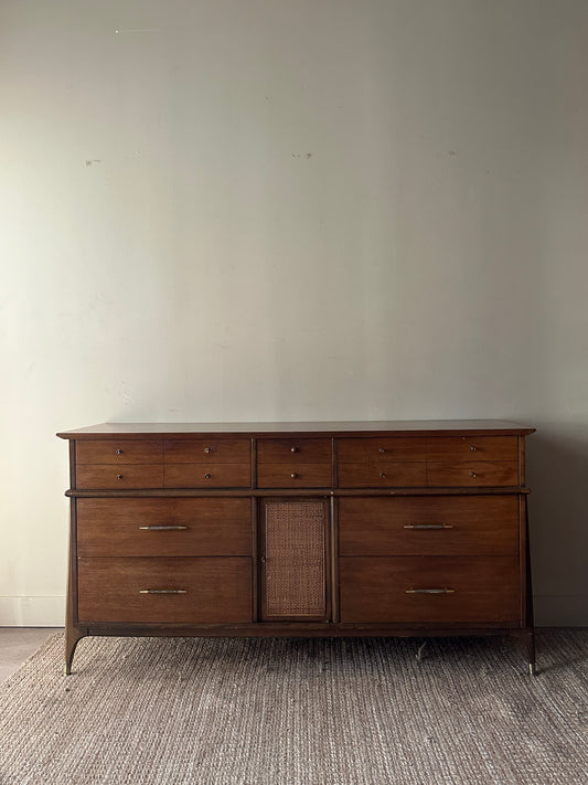 Walnut credenza with rattan door