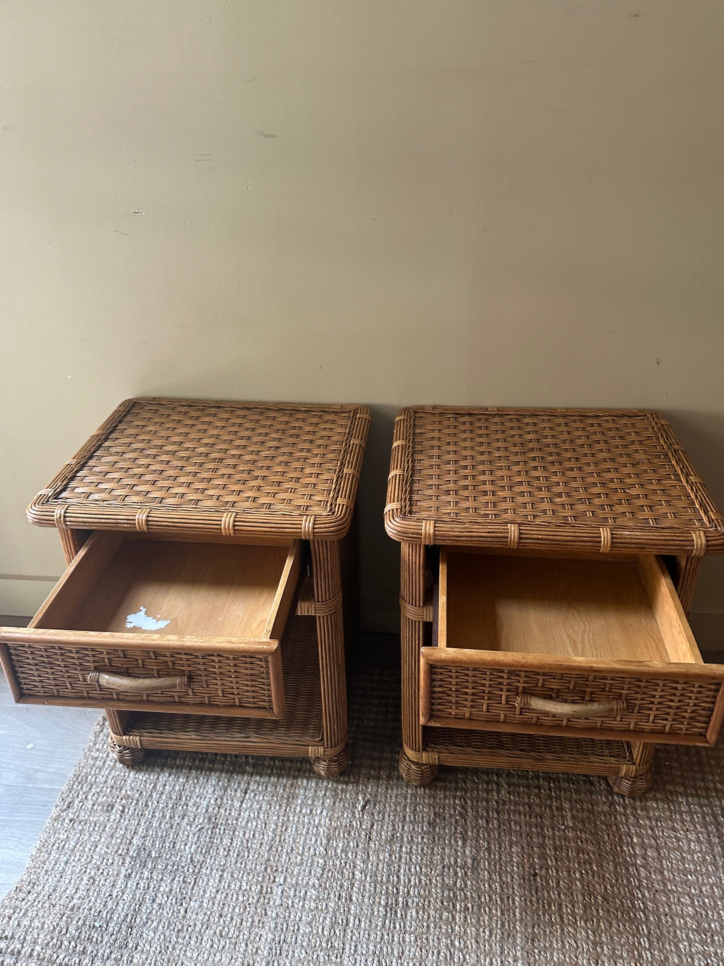 Wicker bedside tables. Sold individually.