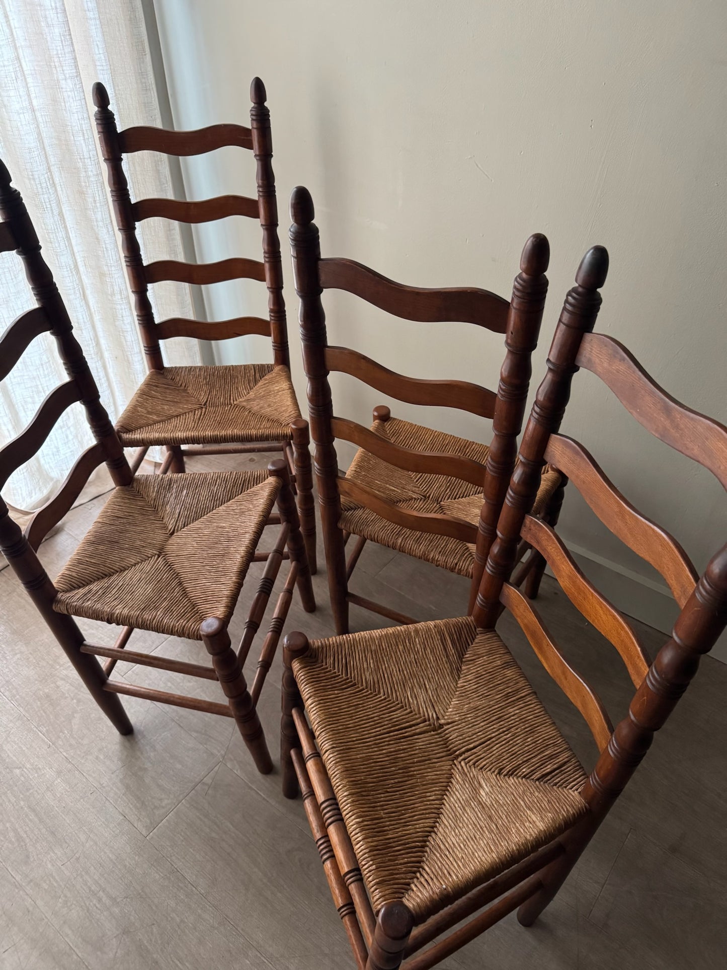 Maple ladder back rush seat chairs. Sold in pairs.
