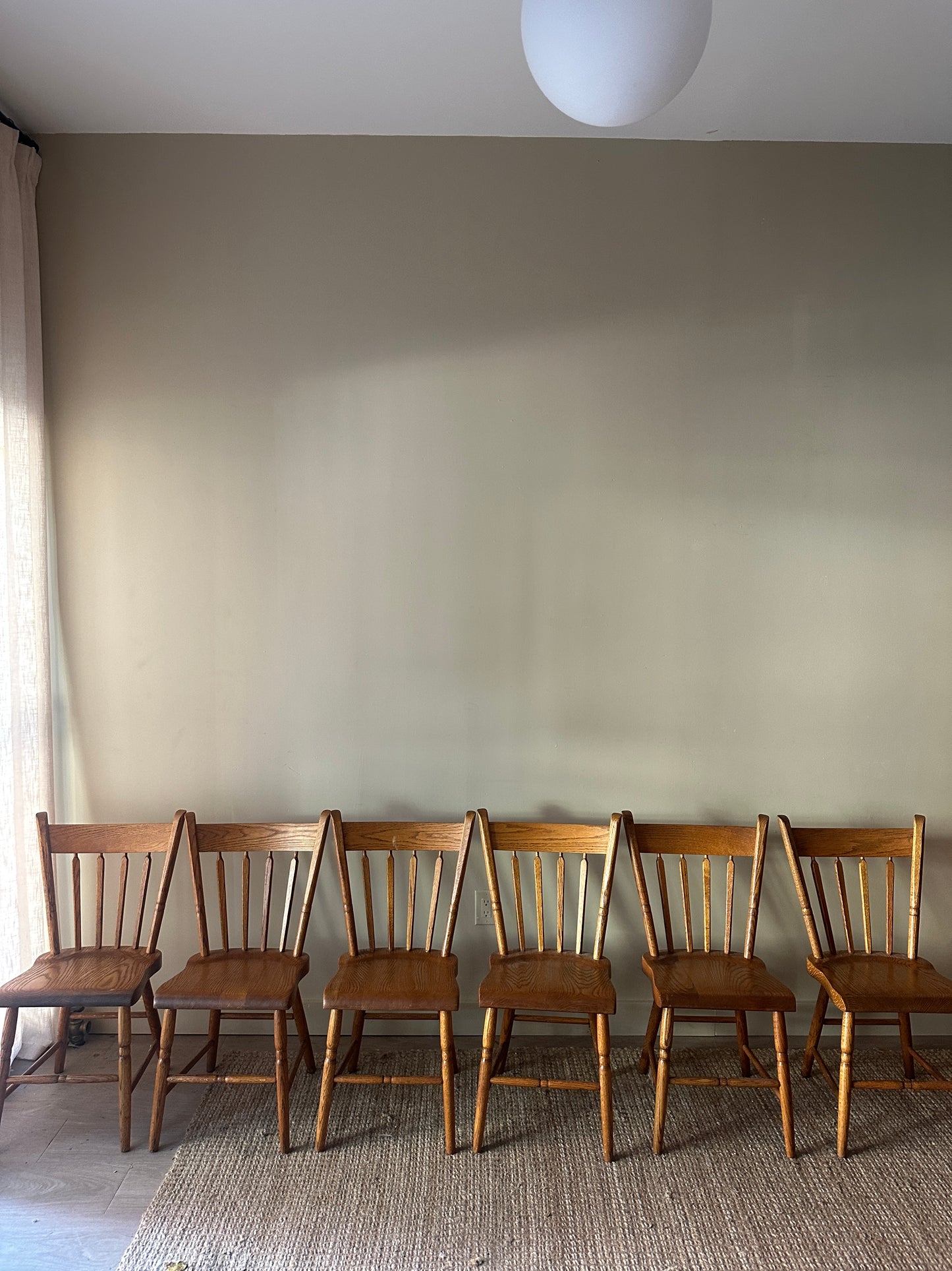 6 oak dining chairs. Sold in pairs.