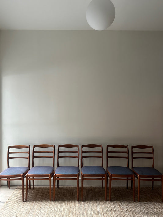 Set of Six Danish Walnut Dining Chairs. Sold individually.