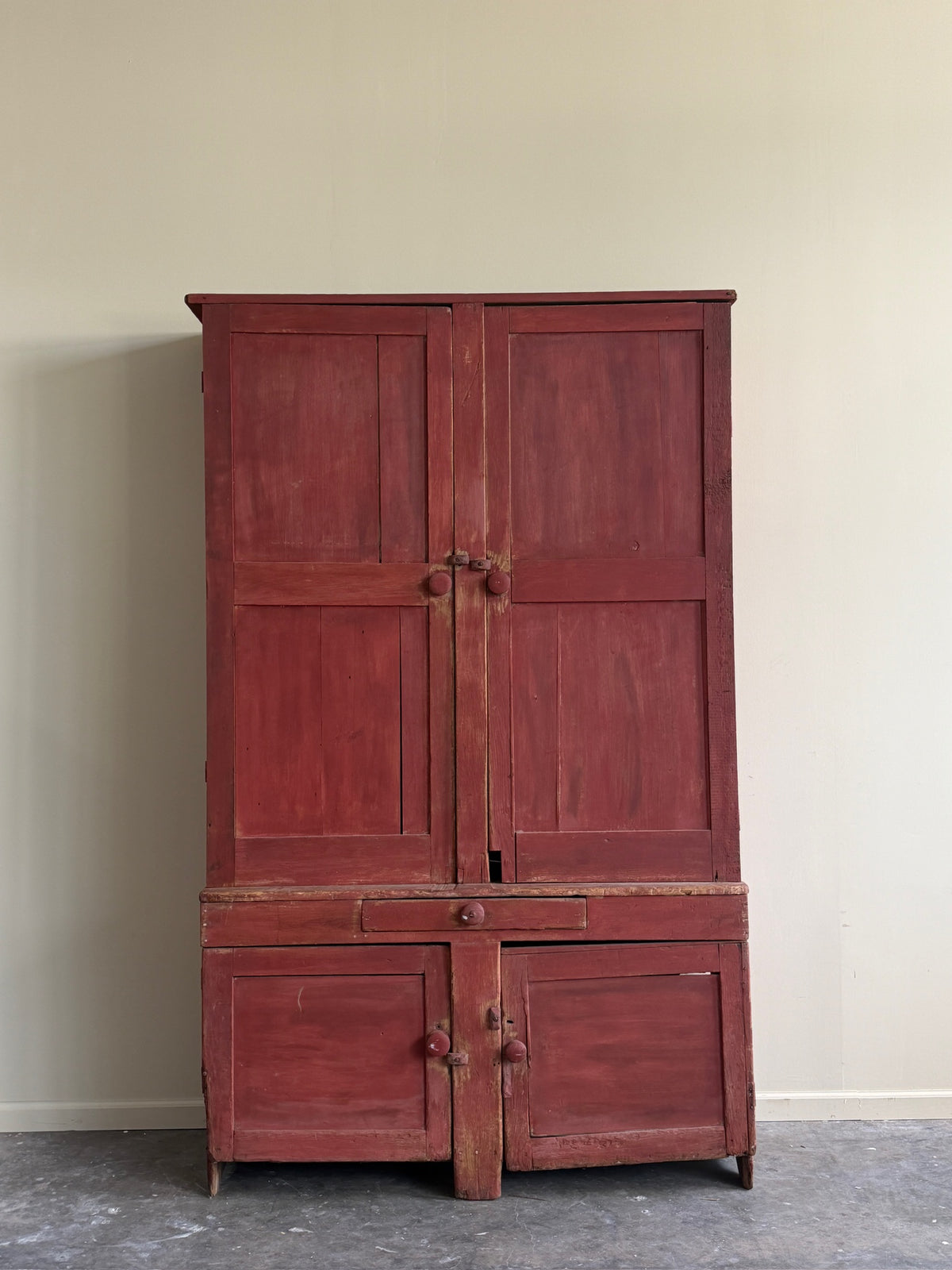 Pennsylvania red painted pine one piece stepback cupboard