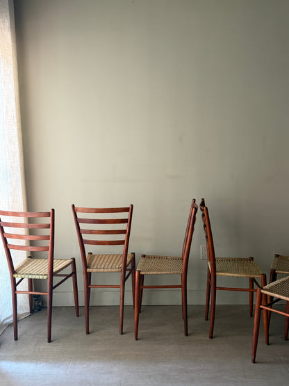 Chiavari Spinetto ladder back dining chairs with wicker cord seats. Sold as a set of 6.
