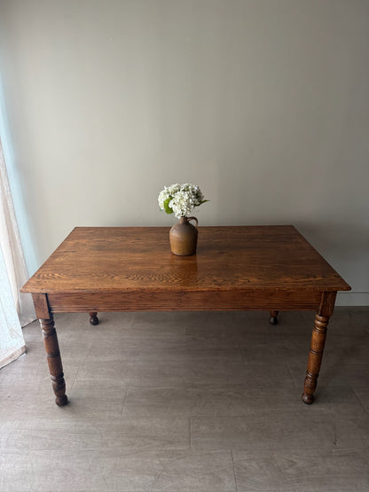 Golden oak dining table