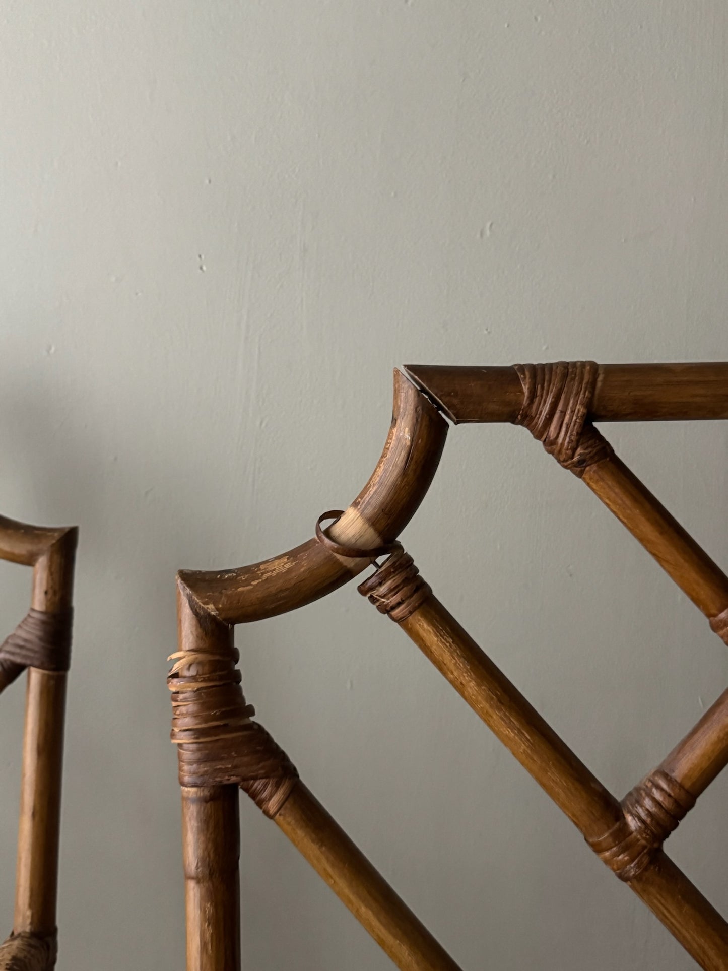 Bamboo arm chairs. Sold individually.