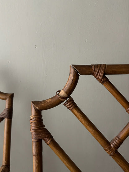 Bamboo arm chairs. Sold individually.
