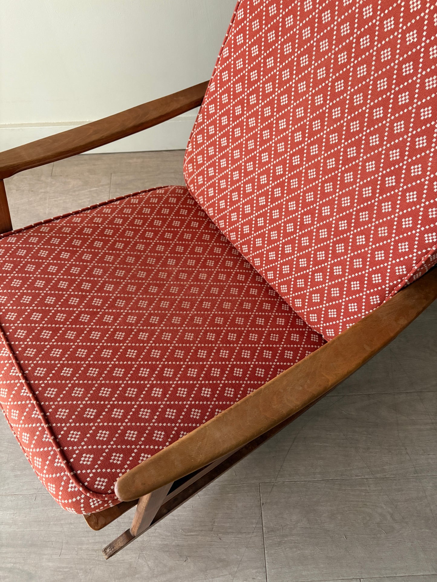 Walnut upholstered rocking chair