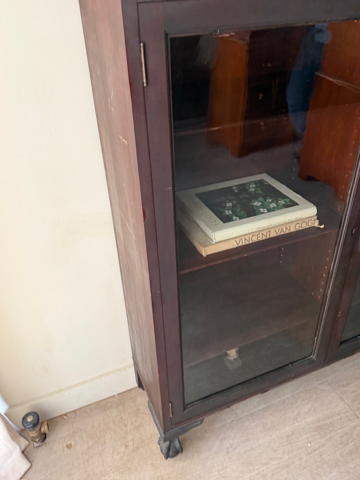 Mahogany claw foot display cabinet