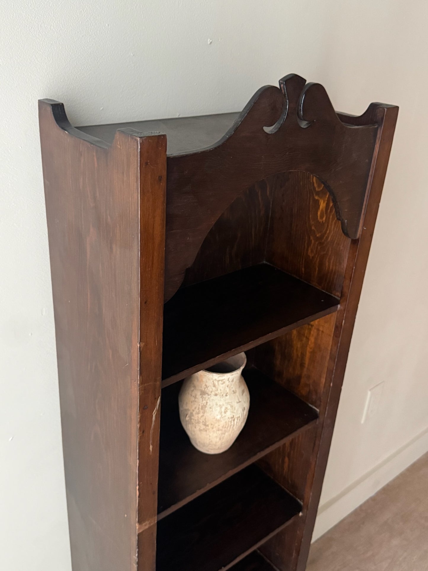 Narrow stained pine shelf