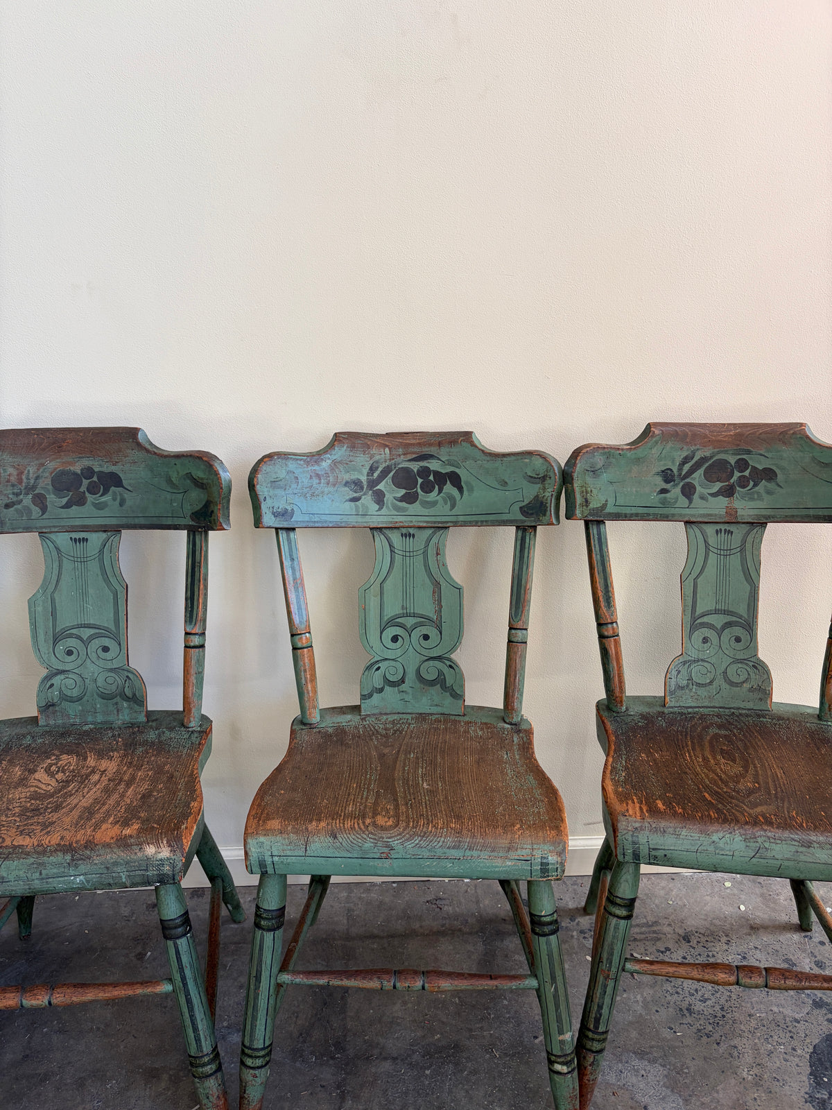 Pennsylvania Sheraton Paint-Decorated Plank Seat Chairs. Sold in pairs.