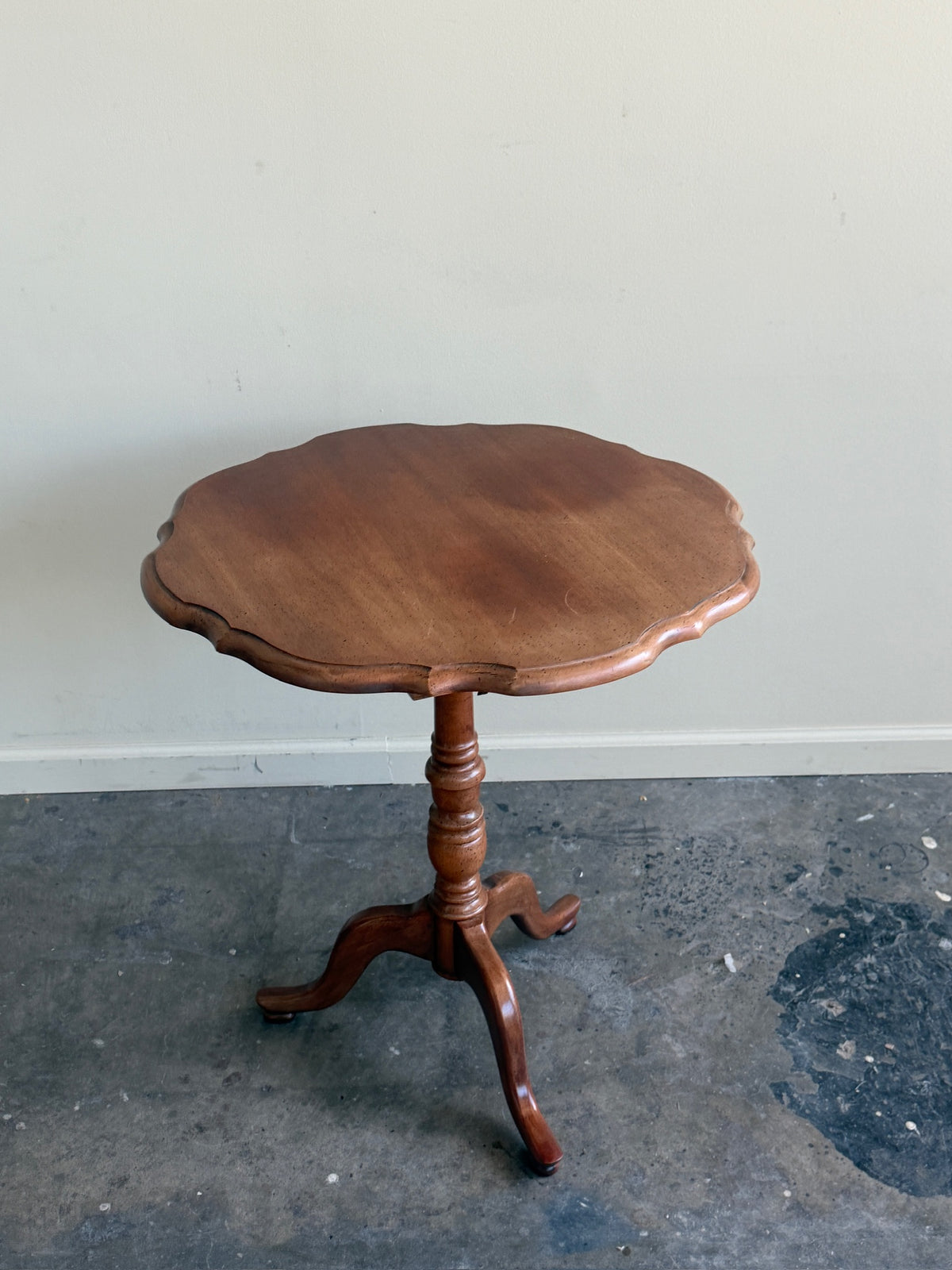 Walnut tilt-top side table