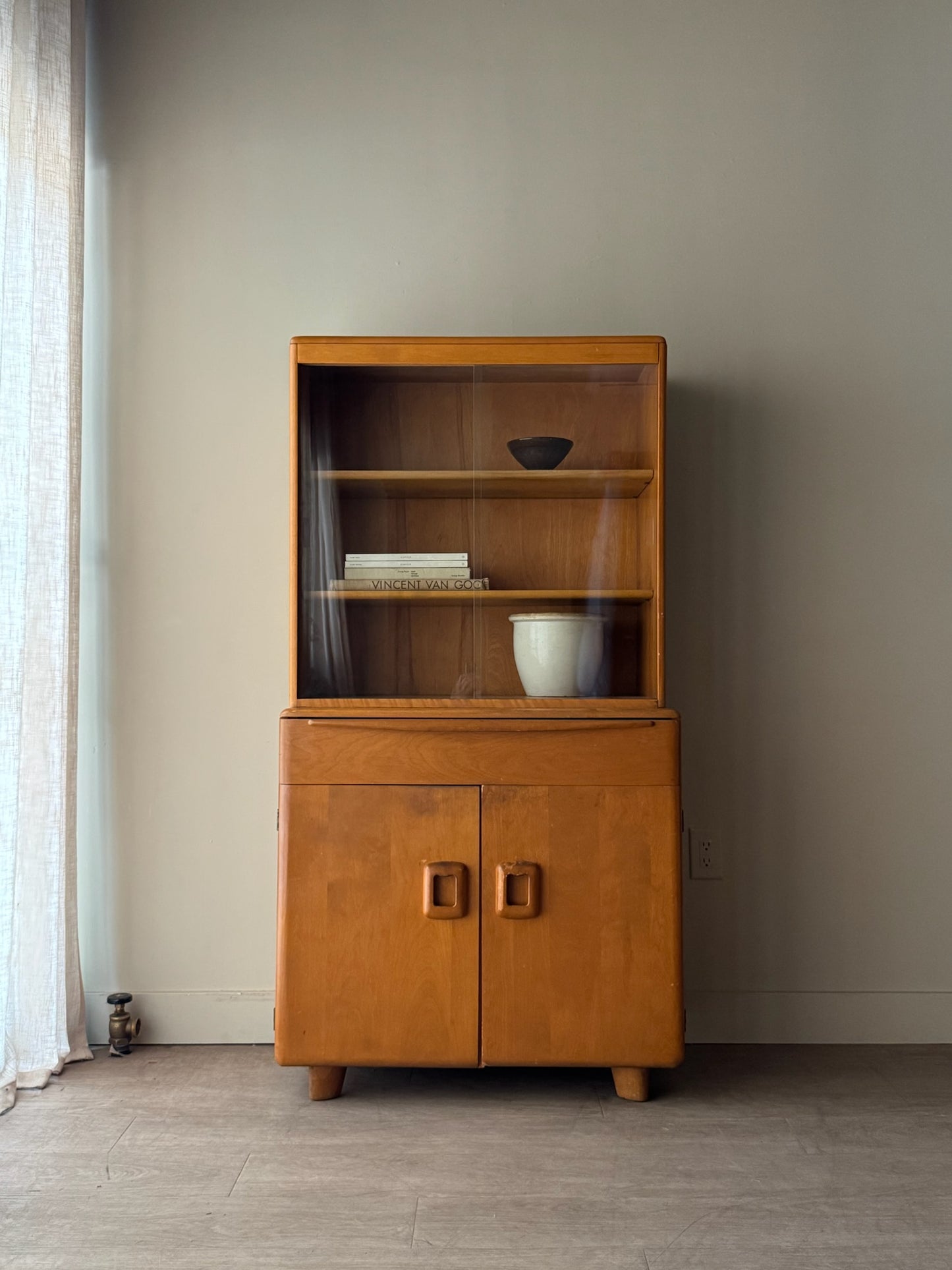 Heywood Wakefield maple two piece display cabinet