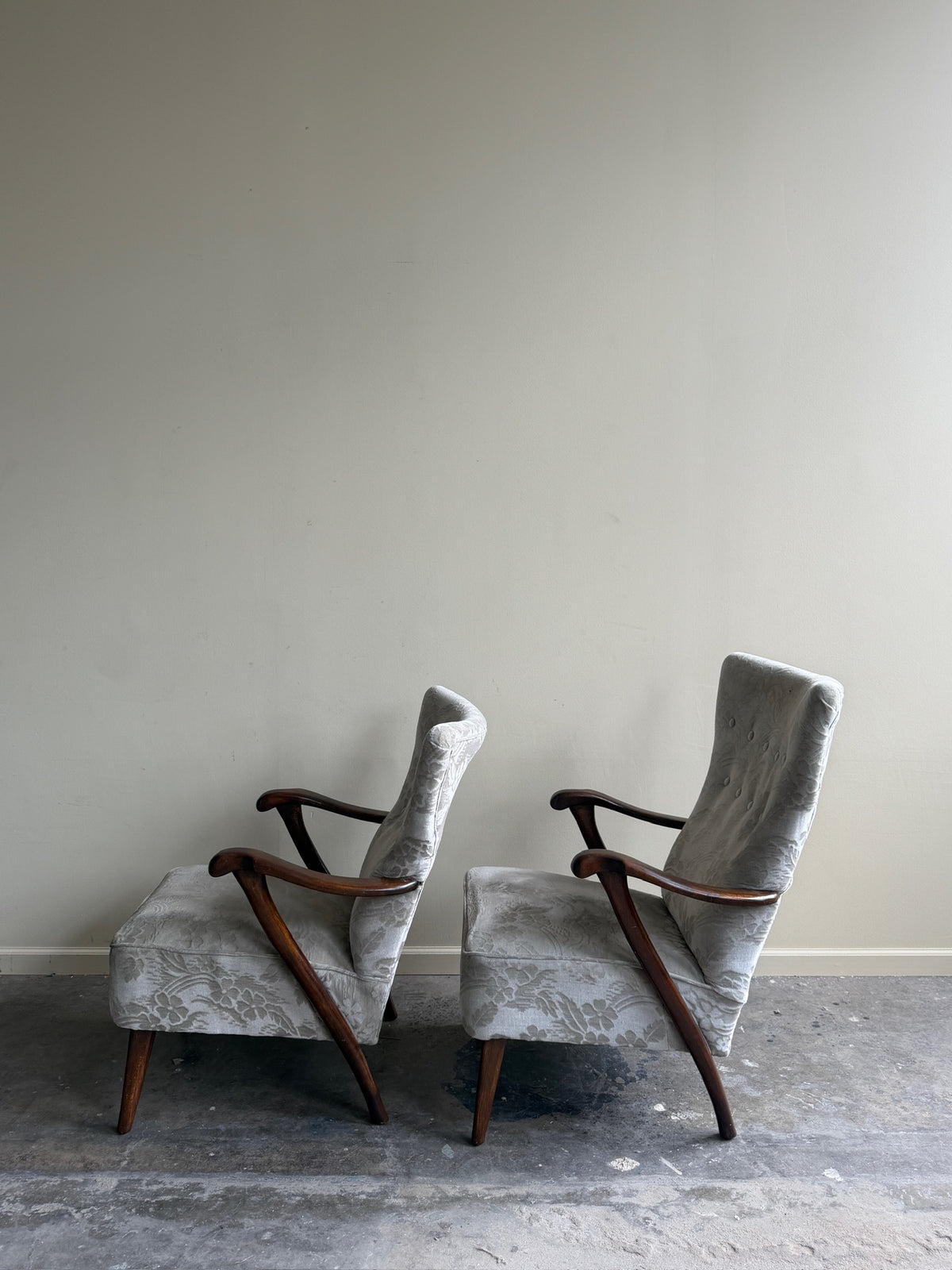 Danish wingback grey floral velvet lounge chairs (left)