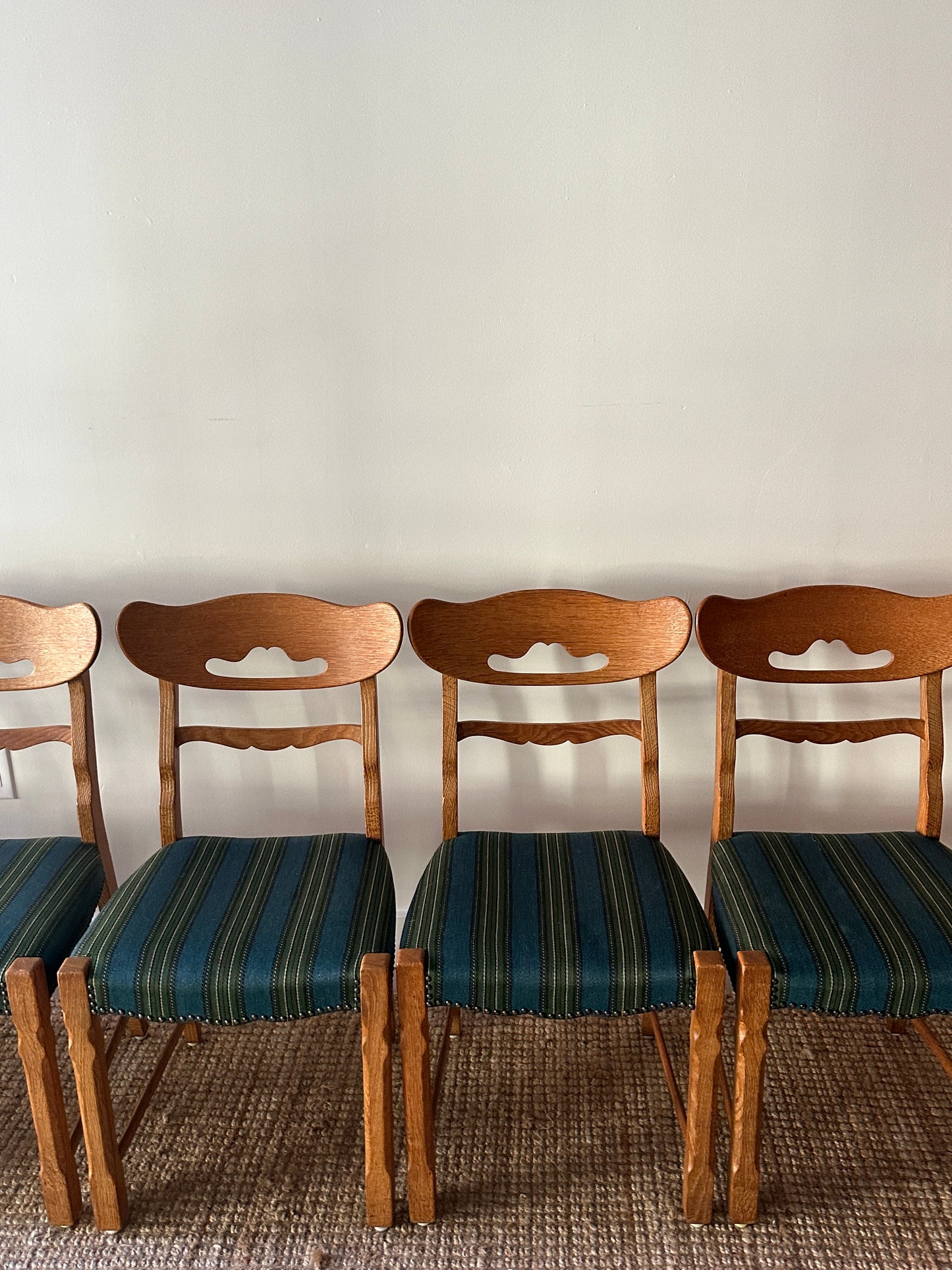 White oak wool and wool dining chairs sold in sets of 2