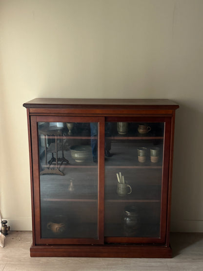 Glass sliding door display case