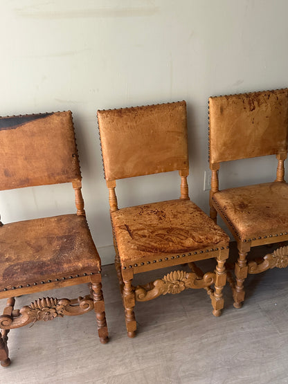 Leather and oak dining chairs. Sold individually.