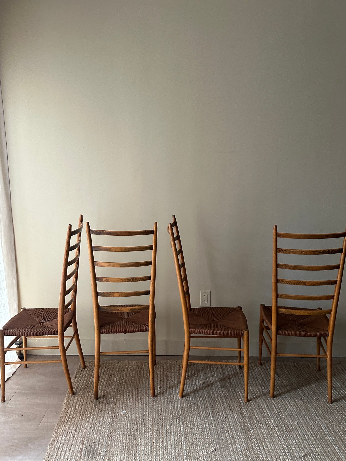 Woven ladder back chairs. Sets of 2.