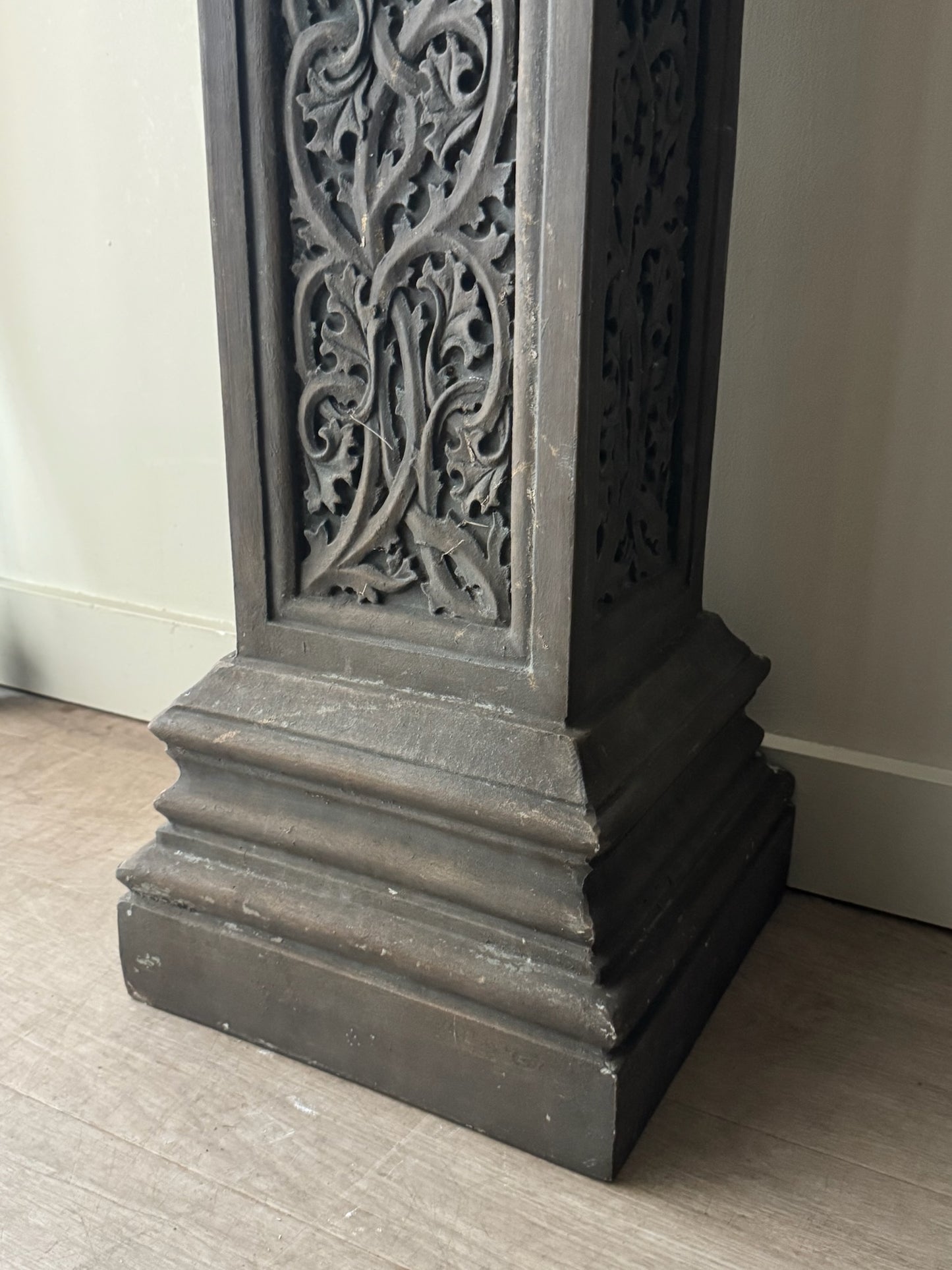 Carved pedestal