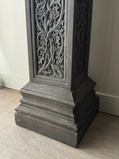 Carved pedestal