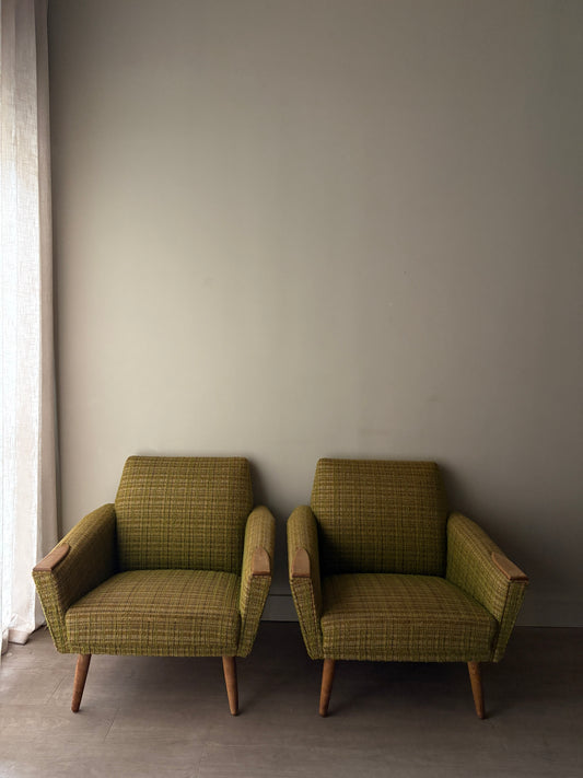 Green plaid Danish lounge chairs. Sold individually.