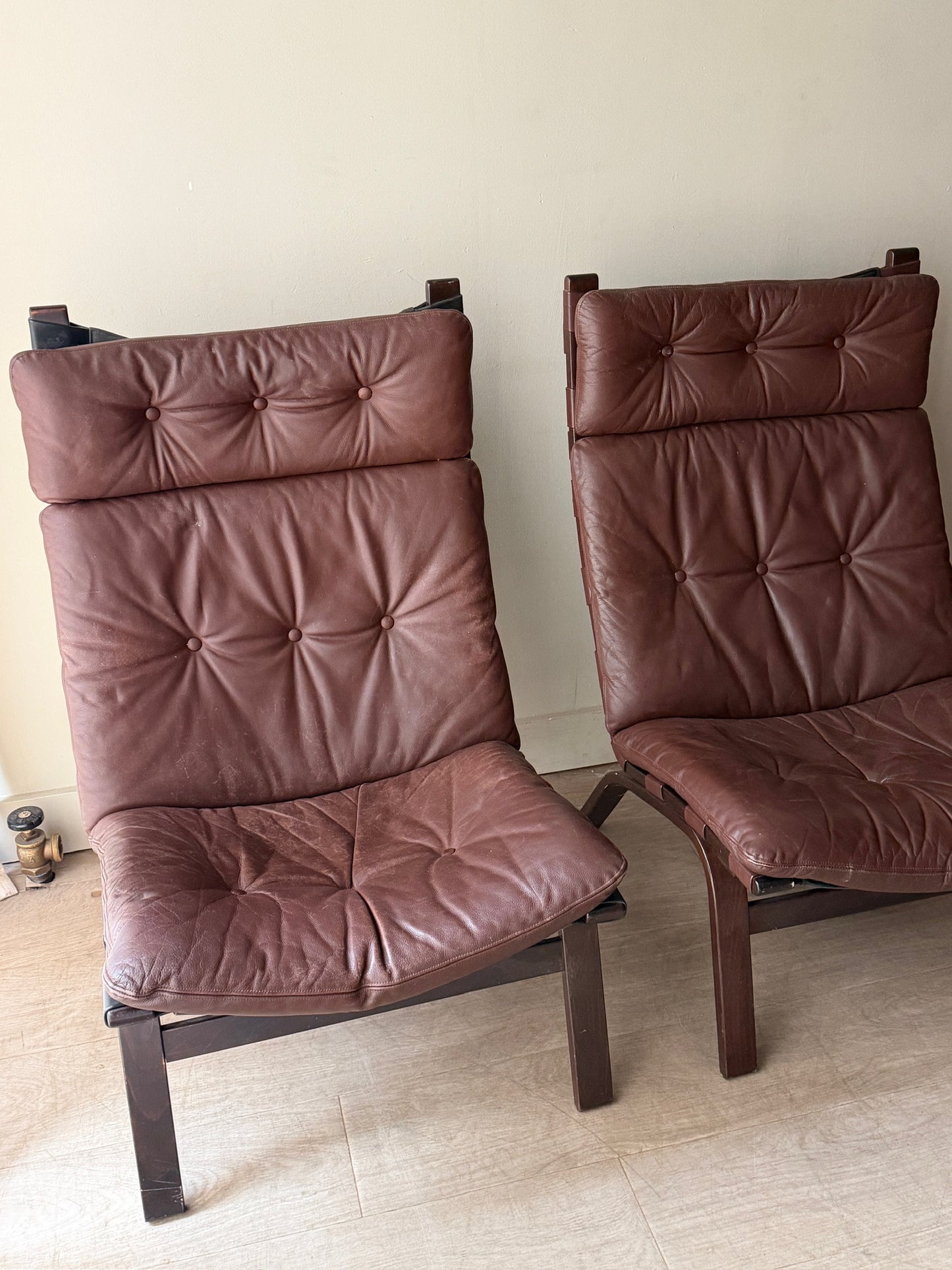 Farstrup Danish beech and leather lounge chairs. Sold individually.