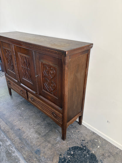 Carved oak sideboard