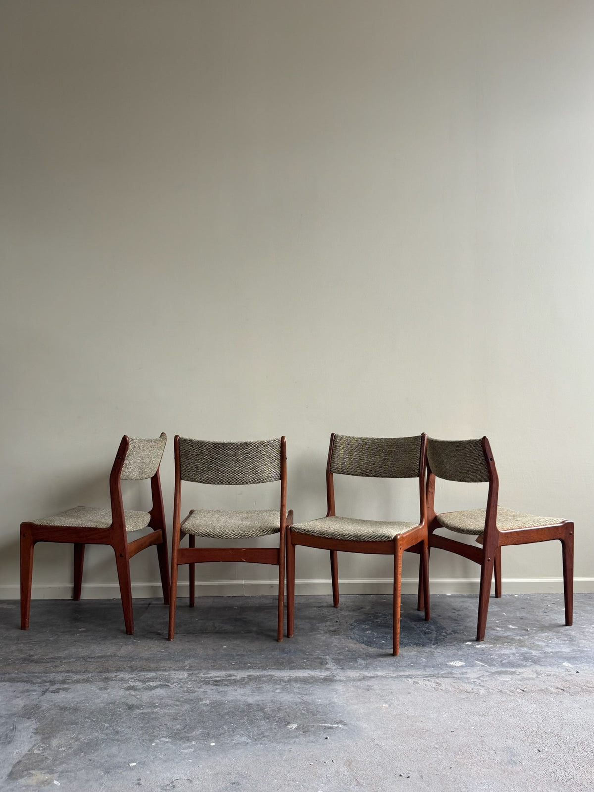 Scandinavian teak upholstered chairs. Sold in pairs.