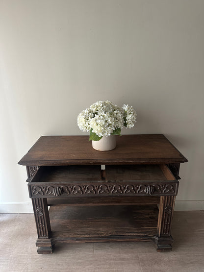 Carved console table