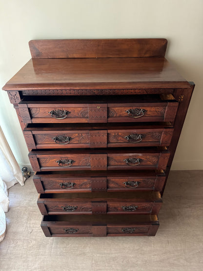 Carved Eastlake walnut dresser with side lock