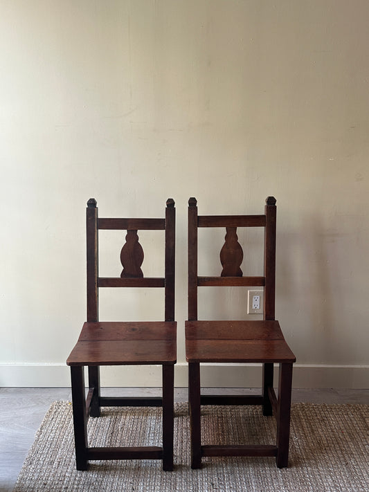 Pair of Mission walnut dining chairs.