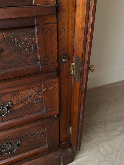 Carved Eastlake walnut dresser with side lock